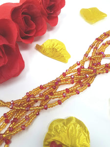 Red and gold waist bead