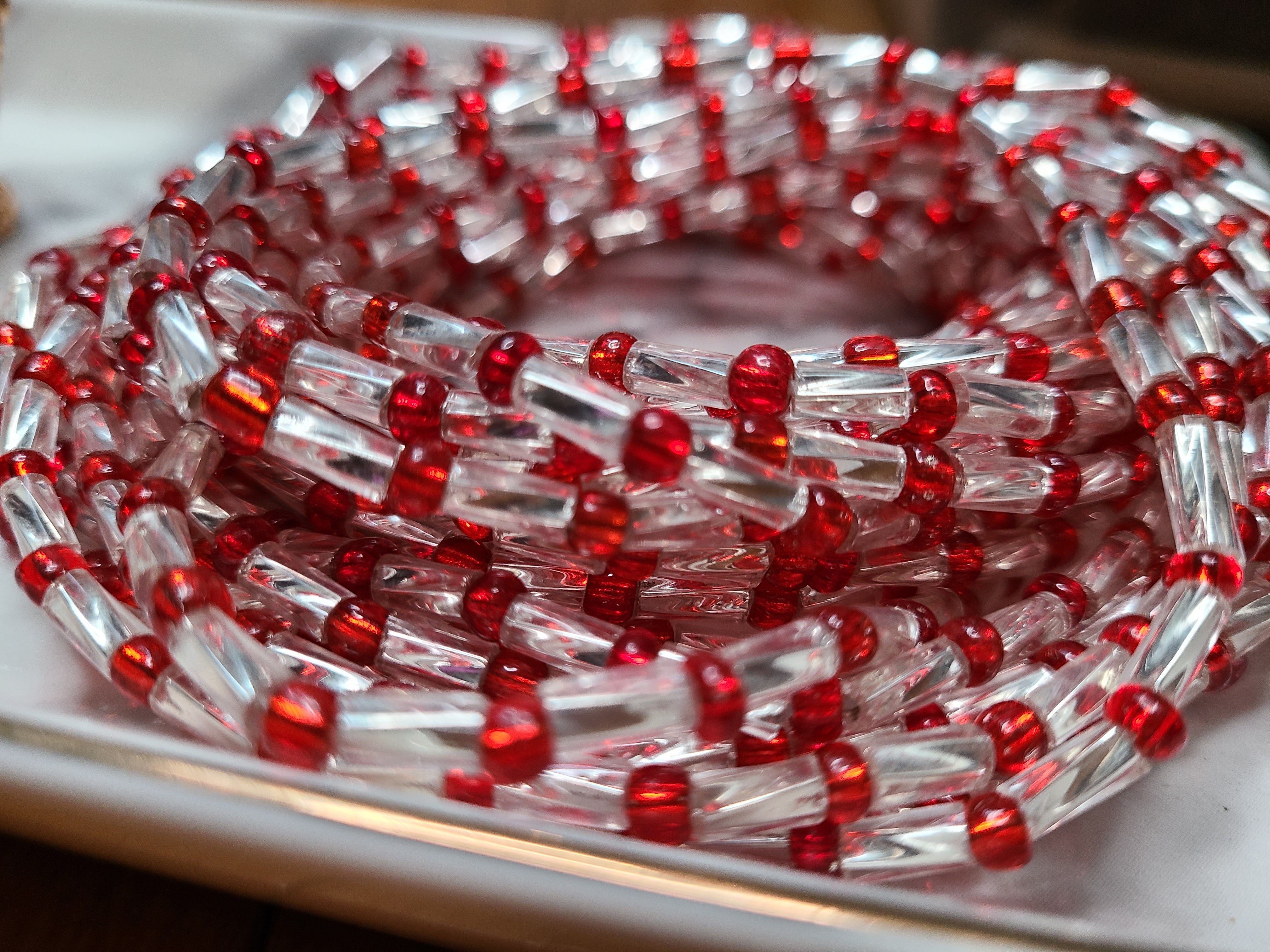 Red and clear Gambian waist beads